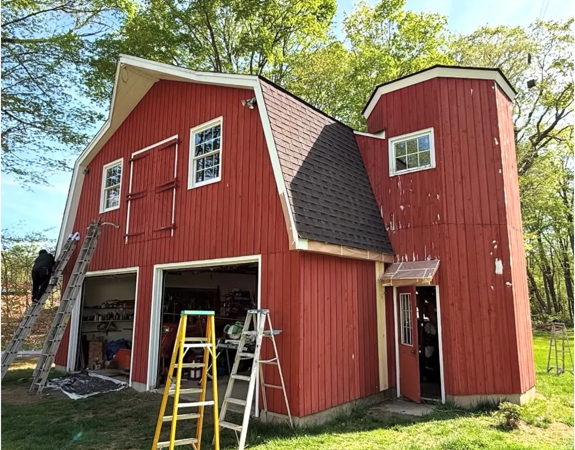 Before — Red barn front, prepped and painted