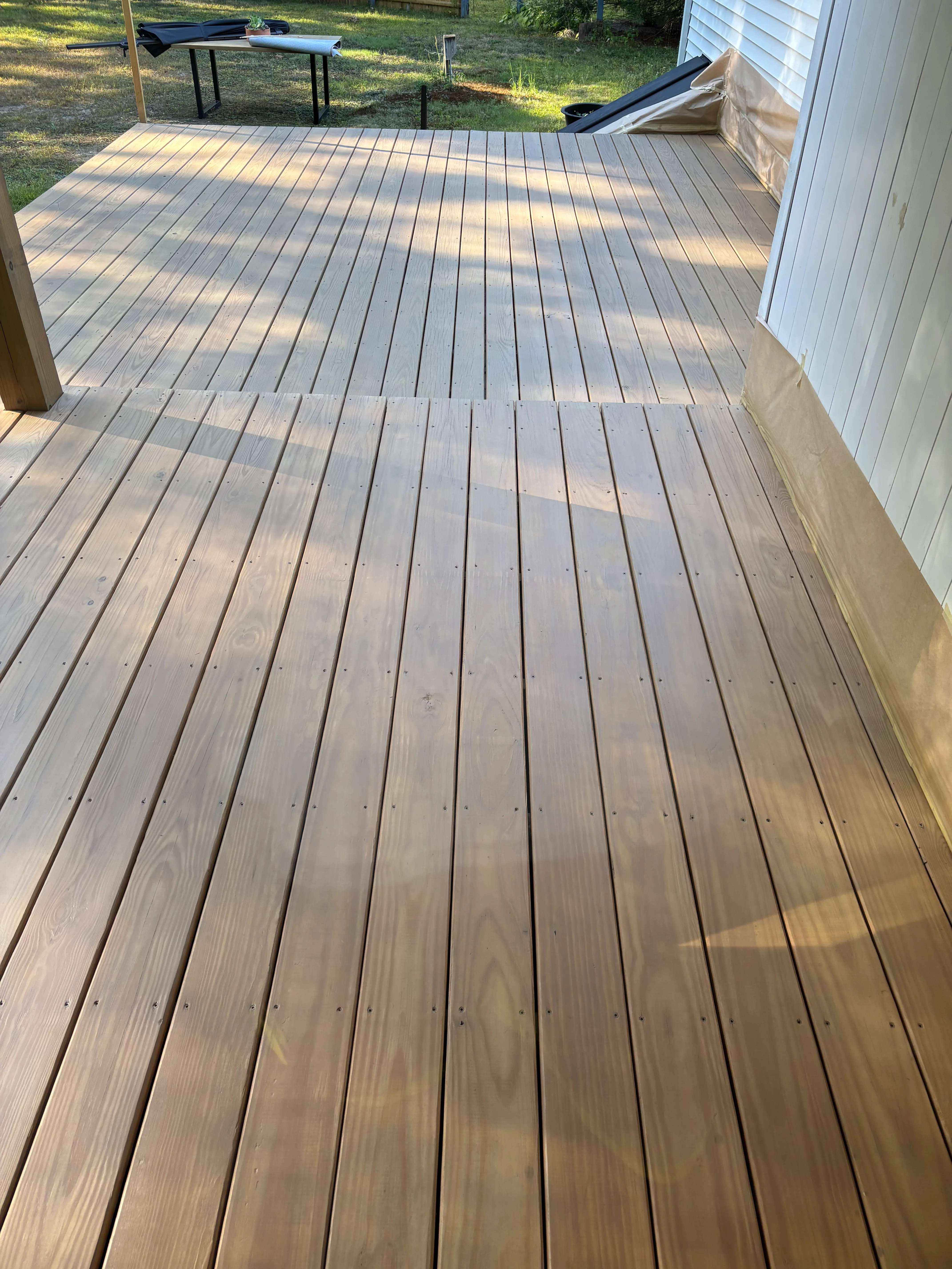 A deck after cleaning and re-staining