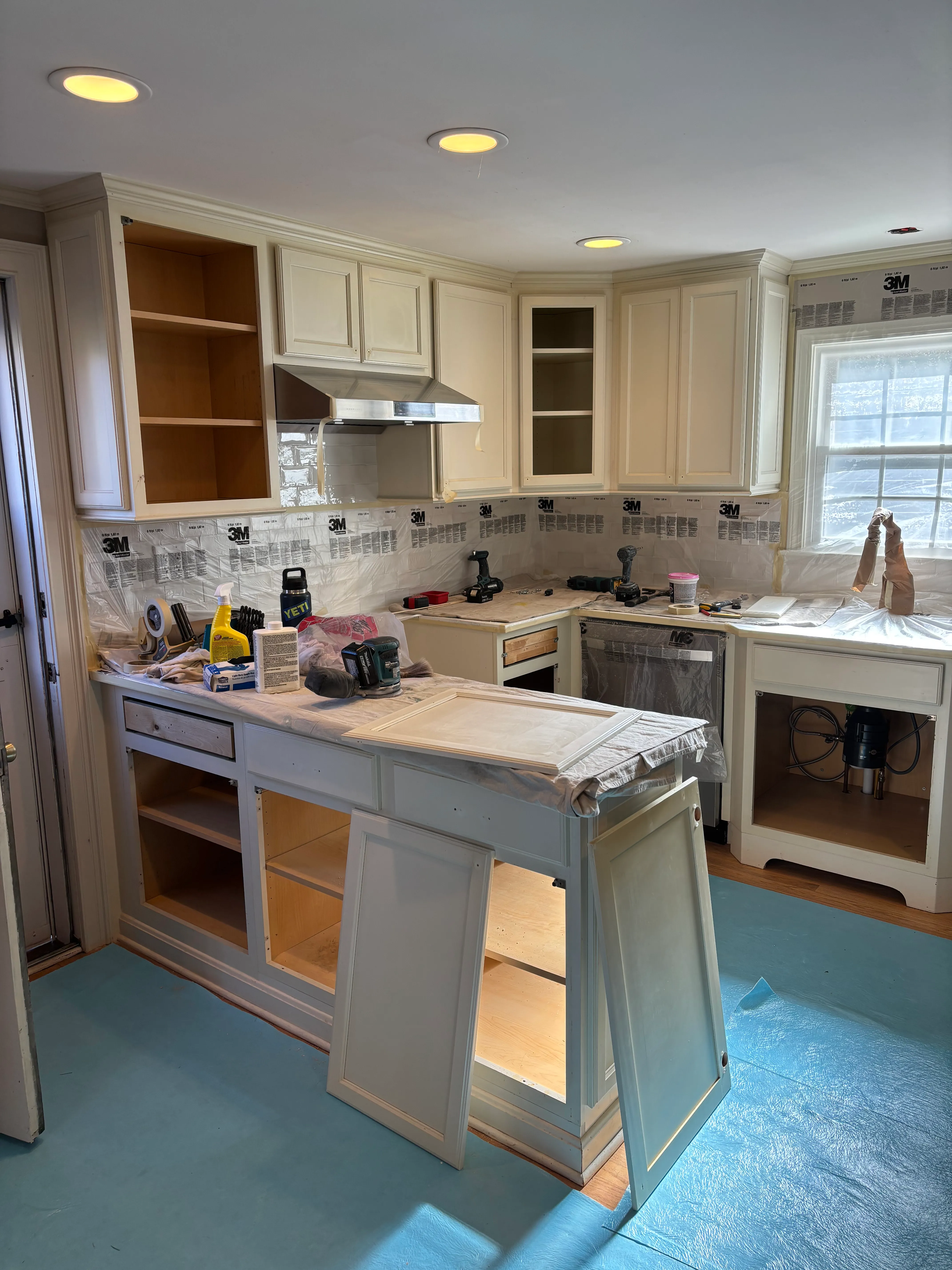 Before — Kitchen cabinets refinished (detail)