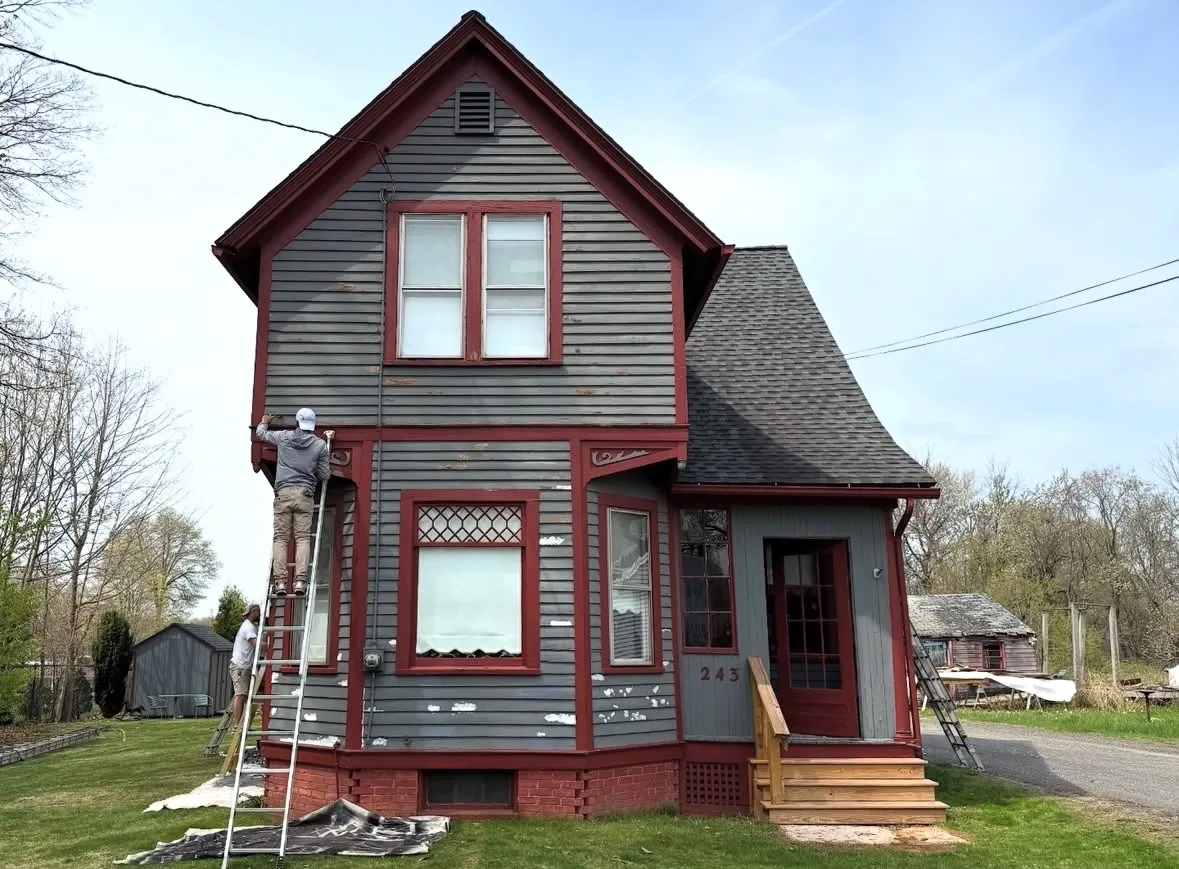 Before — Victorian home repainted in period colors (front)